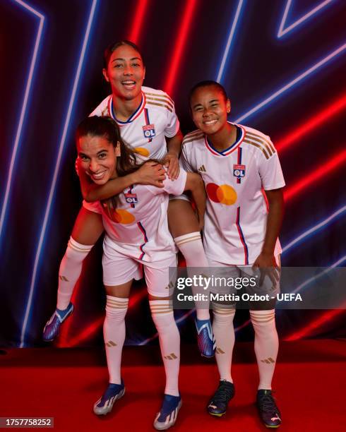 Amel Majri, Selma Bacha and Alice Sombath of Olympique Lyonnais pose for a portrait during the UEFA Women's Champions League Official Portraits shoot...