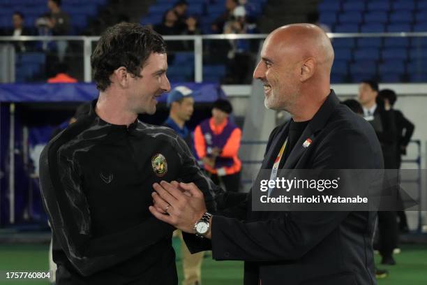 Colum Curitis , coach of Kaya FC-Iloilo, and Kevin Musca , coach of Yokohama F.Marinos, exchange looks prior to the AFC Champions League Group G...