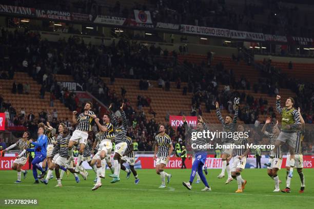 Juventus players celebrate the 1-0 victory following the final whistle of the Serie A TIM match between AC Milan and Juventus FC at Stadio Giuseppe...