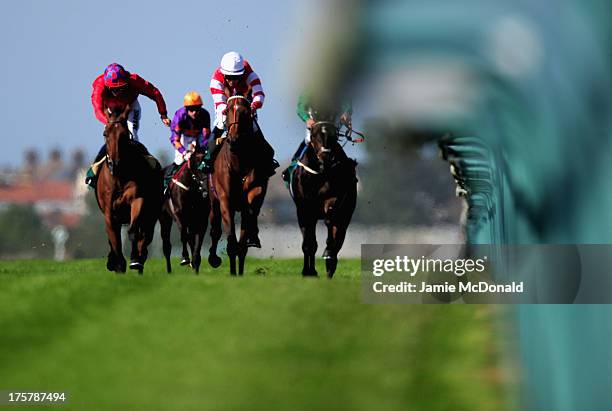 Dambuster ridden by William Buick wins the jenningsbet.com handicap stakes during racing at Yarmouth racecourse on August 8, 2013 in Yarmouth,...
