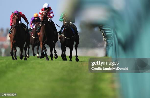 Dambuster ridden by William Buick wins the jenningsbet.com handicap stakes during racing at Yarmouth racecourse on August 8, 2013 in Yarmouth,...