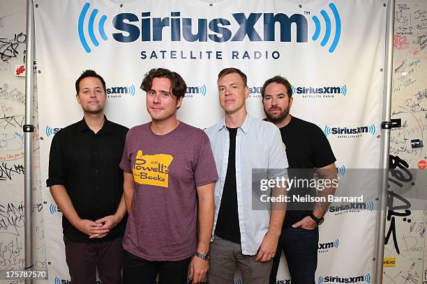 Musicians Tom Linton, Jim Adkins, Rick Burch and Zach Lind of the band Jimmy Eat World visit SiriusXM Studios on August 8, 2013 in New York City.
