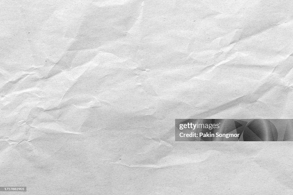 Gray color eco recycled kraft paper sheet texture cardboard background.