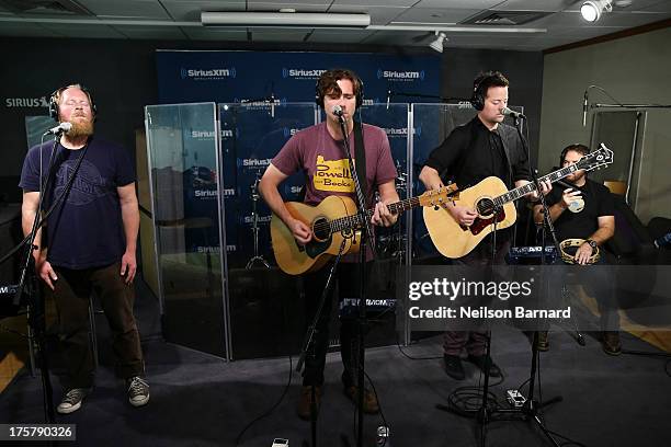 Musicians Jim Adkins, Rick Burch and Zach Lind of the band Jimmy Eat World visit SiriusXM Studios on August 8, 2013 in New York City.