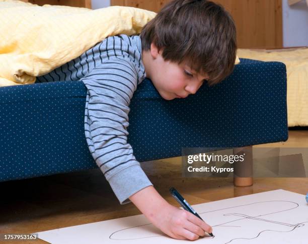 male child age eight years - 9 hand drawn patterns stock-fotos und bilder