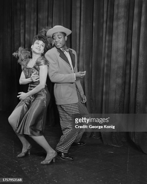 Katherine Dunham and Vanoye Aikens , of the Katherine Dunham Dance Company, performing in 'A Caribbean Rhapsody' at the Prince of Wales Theatre in...