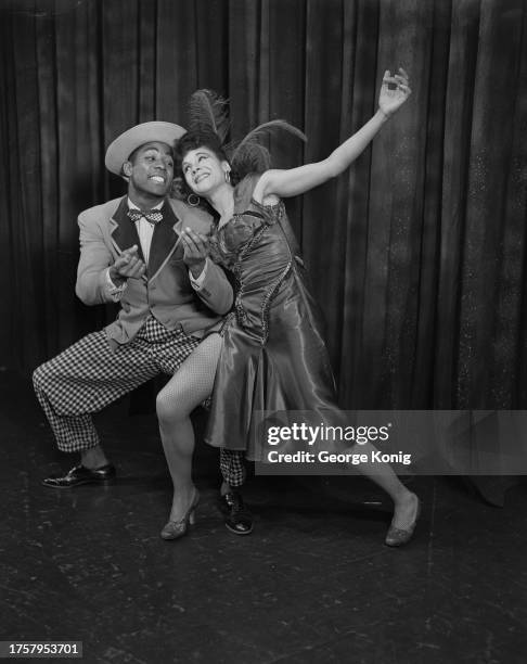 Katherine Dunham and Vanoye Aikens , of the Katherine Dunham Dance Company, performing in 'A Caribbean Rhapsody' at the Prince of Wales Theatre in...