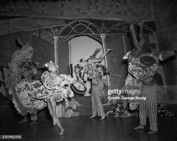 Choreographer Katherine Dunham and her dance company performing 'A Caribbean Rhapsody' at the Prince of Wales Theatre in London, June 1948.