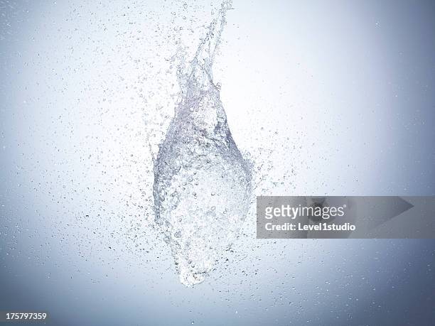 high speed image of water exploding - super slow motion stock pictures, royalty-free photos & images