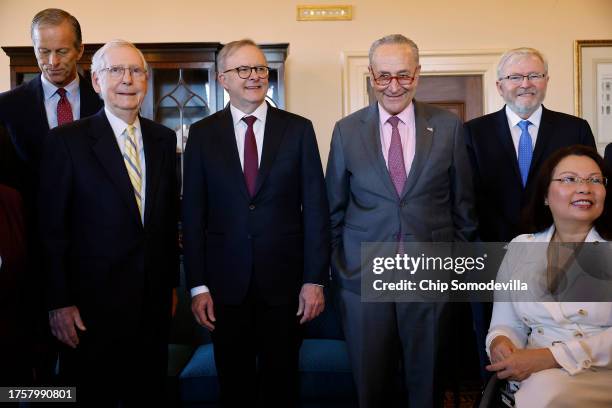 Australian Prime Minister Anthony Albanese poses for photographs with U.S. Senators, including Sen. John Thune , Senate Minority Leader Mitch...