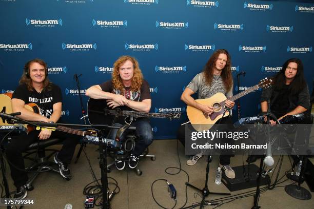 David Ellefson, Dave Mustaine, Chris Broderick and Shawn Drover of Megadeth visit SiriusXM Studios on August 8, 2013 in New York City.