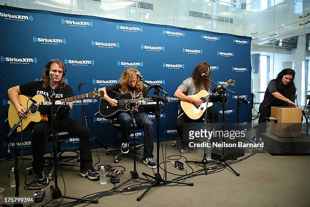 David Ellefson, Dave Mustaine, Chris Broderick and Shawn Drover of Megadeth perform at SiriusXM Studios on August 8, 2013 in New York City.
