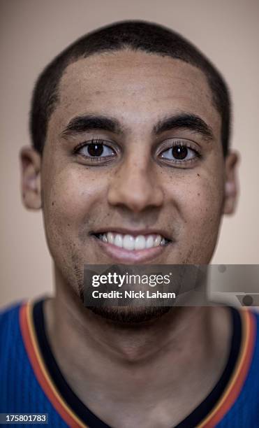 Grant Jerrett of the Oklahoma City Thunder poses for a portrait during the 2013 NBA rookie photo shoot at the MSG Training Center on August 6, 2013...