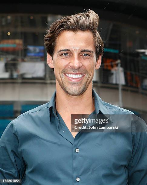 Madison Hildebrand rings the closing bell at the NASDAQ MarketSite on August 8, 2013 in New York City.