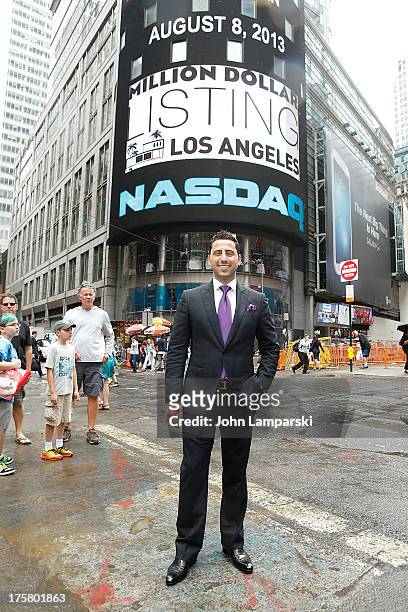 Josh Altman rings the closing bell at the NASDAQ MarketSite on August 8, 2013 in New York City.