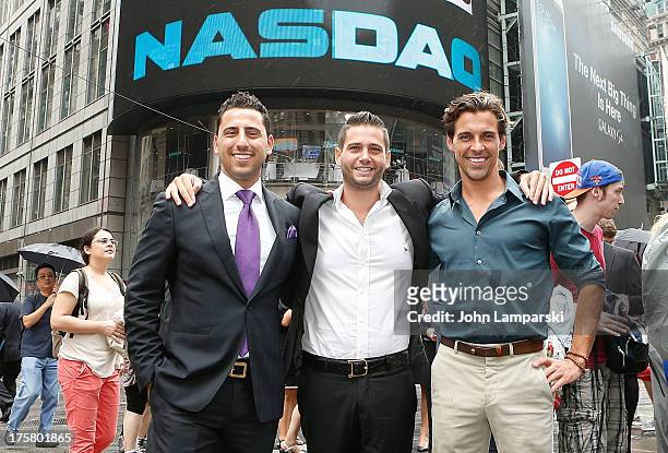 Josh Altman, Josh Flagg and Madison Hildebrand ring the closing bell at the NASDAQ MarketSite on August 8, 2013 in New York City.