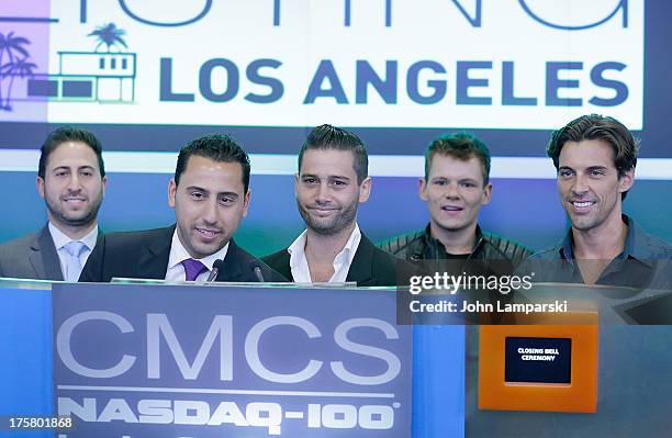 Million Dollar Listing cast members Josh Altman, Josh Flagg, Madison Hildebrand and guests ring the closing bell at the NASDAQ MarketSite on August...