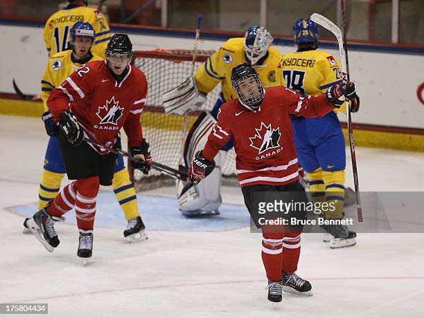 Connor McDavid of Team Canada celebrates his powerplay goal at 4:11 of the second period against Team Sweden during the 2013 USA Hockey Junior...