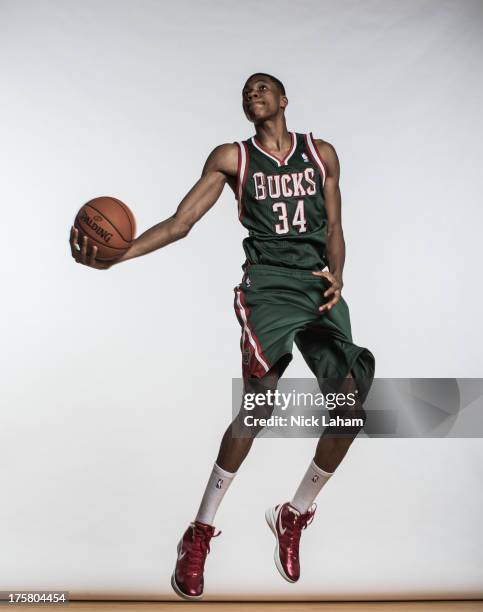 Giannis Antetokounmpo of the Milwaukee Bucks poses for a portrait during the 2013 NBA rookie photo shoot at the MSG Training Center on August 6, 2013...