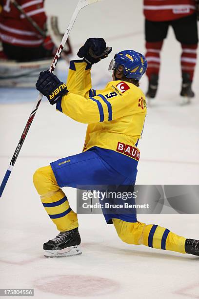 Jacob de la Rose of Team Sweden celebrates his goal at 19:12 of the second period against Team Canada during the 2013 USA Hockey Junior Evaluation...