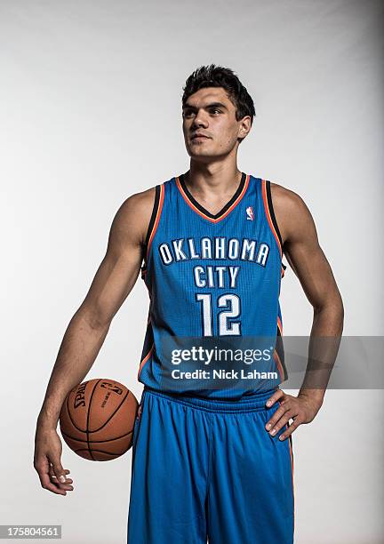 Steven Adams of the Oklahoma City Thunder poses for a portrait during the 2013 NBA rookie photo shoot at the MSG Training Center on August 6, 2013 in...