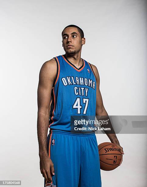 Grant Jerrett of the Oklahoma City Thunder poses for a portrait during the 2013 NBA rookie photo shoot at the MSG Training Center on August 6, 2013...