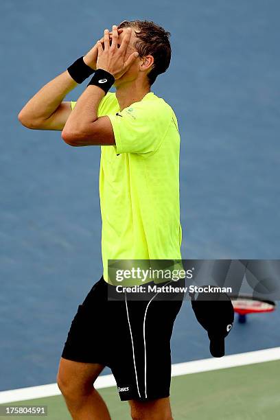 Vasek Pospisil of Canada celebrates match point against Tomas Berdych of Czech Republic during the Rogers Cup at Uniprix Stadium on August 8, 2013 in...