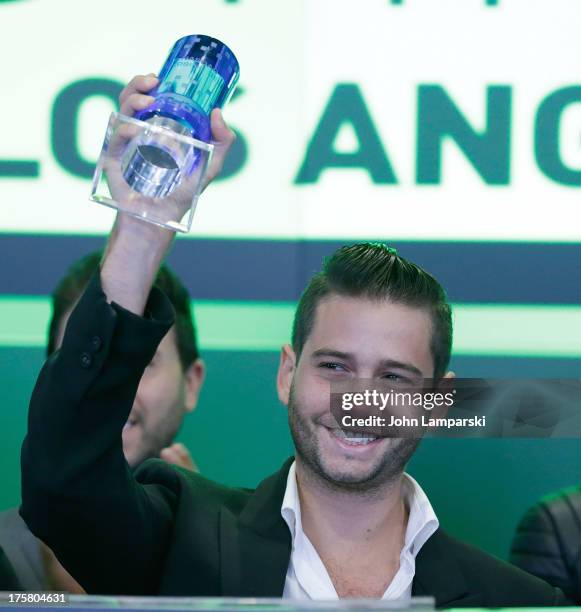 Million Dollar Listing cast member Josh Flagg, rings the closing bell at the NASDAQ MarketSite on August 8, 2013 in New York City.