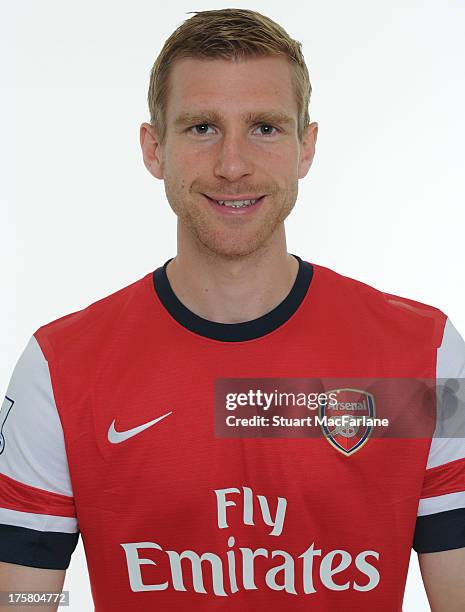 Per Mertesacker of Arsenal poses during the first team photocall at Emirates Stadium on August 08, 2013 in London, England.