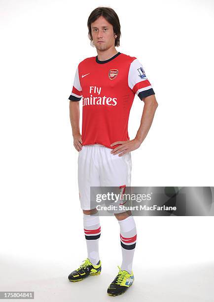 Tomas Rosicky of Arsenal poses during the first team photocall at Emirates Stadium on August 08, 2013 in London, England.