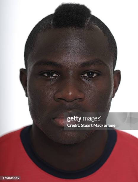 Emmanuel Frimpong of Arsenal poses during the first team photocall at Emirates Stadium on August 08, 2013 in London, England.