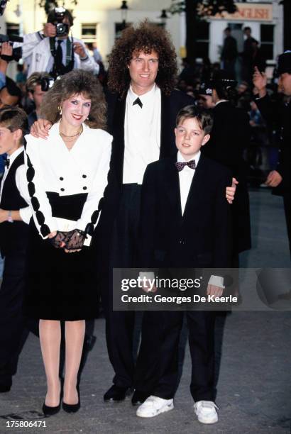 English musician Brian May of Queen with his wife Anita Dobson and his son Jimmy in 1990 ca. In London, England.