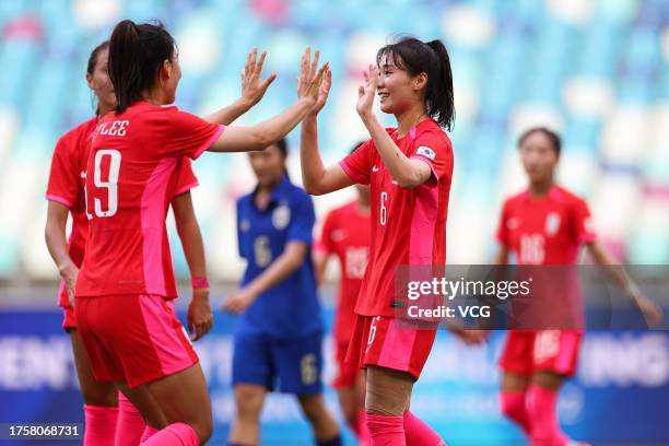 Kang Chae-rim of South Korea celebrates with team mates after scoring a goal during the AFC Women's Asian Olympic Qualifier match between South Korea...