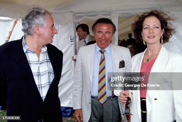 English actress Jenny Seagrove and her fiance film director Michael Winner with journalist Andrew Neil in 1990 ca. In London, England.