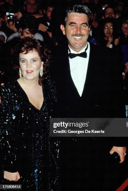 Actress Pauline Collins and her husband John Alderton attend the premiere of 'Shirley Valentine' at the Empire cinema on October 11, 1989 in London,...