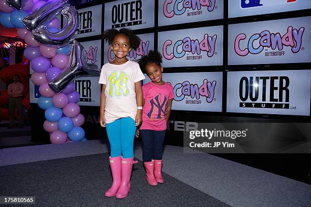 Jaeden Arie Sabathia and Cyia Sabathia attend the CCandy Children's Clothing Line Launch at MLB Fan Cave on August 8, 2013 in New York City.