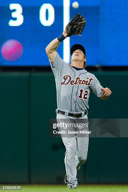 Left fielder Andy Dirks of the Detroit Tigers catches a fly ball hit by Carlos Santana of the Cleveland Indians during the seventh inning at...
