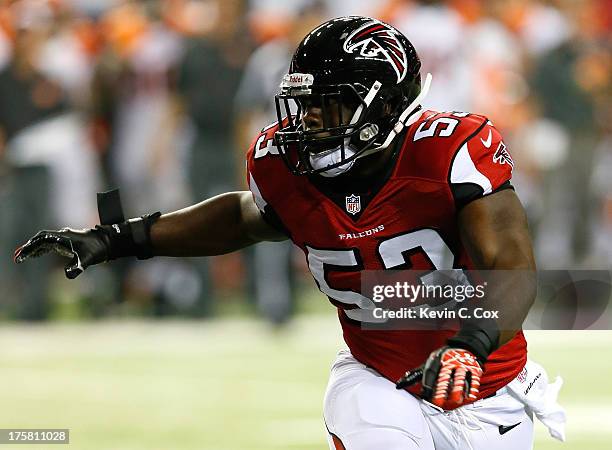 Brian Banks of the Atlanta Falcons runs the defense against the Cincinnati Bengals in the fourth quarter at Georgia Dome on August 8, 2013 in...