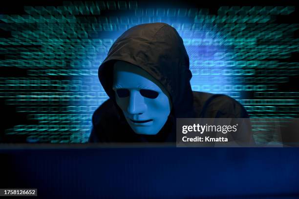 computer hacker with digital code background. - terrorism stock pictures, royalty-free photos & images