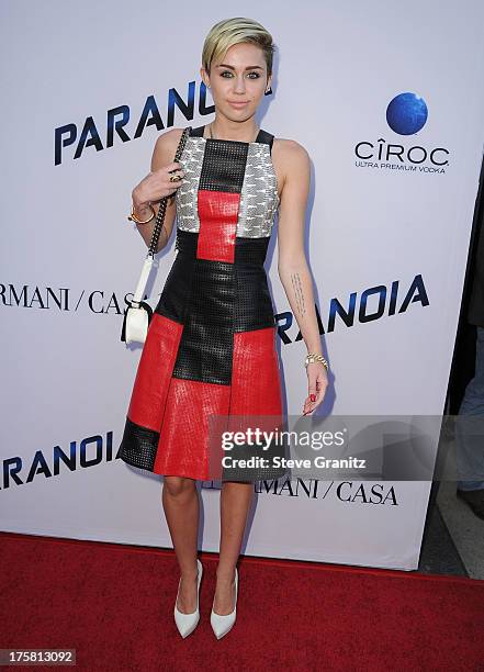 Miley Cyrus arrives at the "Paranoia" - Los Angeles Premiere at DGA Theater on August 8, 2013 in Los Angeles, California.