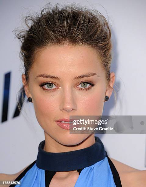 Amber Heard arrives at the "Paranoia" - Los Angeles Premiere at DGA Theater on August 8, 2013 in Los Angeles, California.