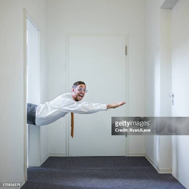business man with super powers - bizarre office stock pictures, royalty-free photos & images