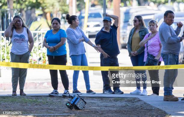 Van Nuys, CA Parents wait for news after an altercation injuring several students and campus lockdown at Van Nuys High School on Wednesday, Nov. 1,...