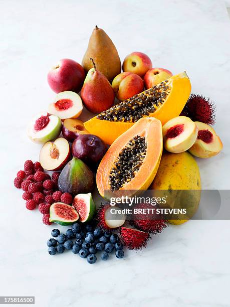 variety of fresh fruits - tropische frucht stock-fotos und bilder