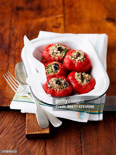 stuffed red capisicum peppers - red bell pepper stock pictures, royalty-free photos & images
