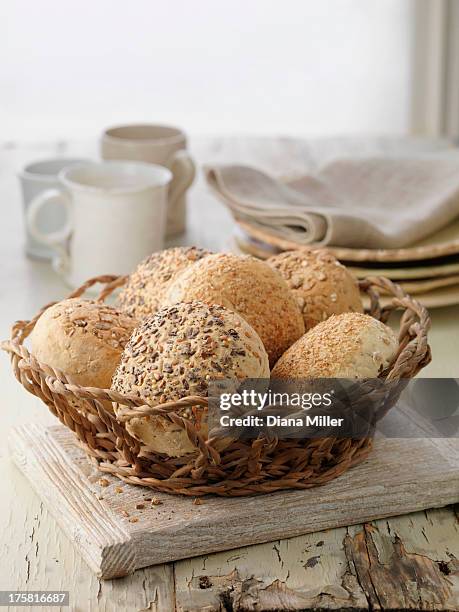 selection of bread rolls, mixed seed and whole grain. oats, poppy seeds, pumpkin seeds - bun bread stock pictures, royalty-free photos & images