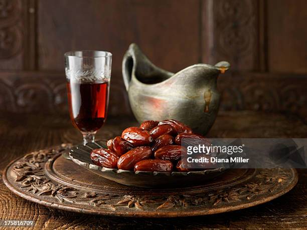 speciality gravy containing dates and sherry on carved circular board with gray jug and crackers - sherry stock pictures, royalty-free photos & images