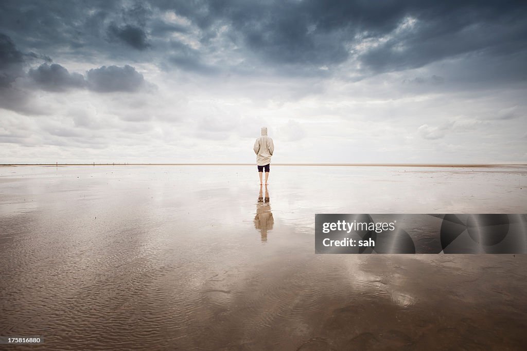 Woman on beach, Schleswig Holstein, Germany