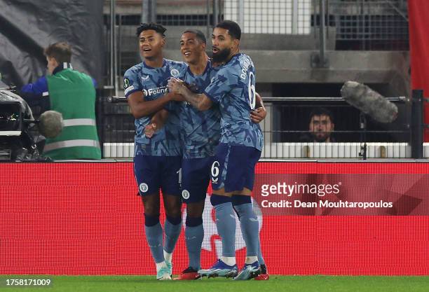 Youri Tielemans of Aston Villa celebrates with Ollie Watkins and Douglas Luiz of Aston Villa after scoring the team's second goal during the UEFA...