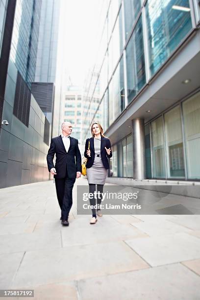 Man Walking Past Building Photos and Premium High Res Pictures - Getty ...
